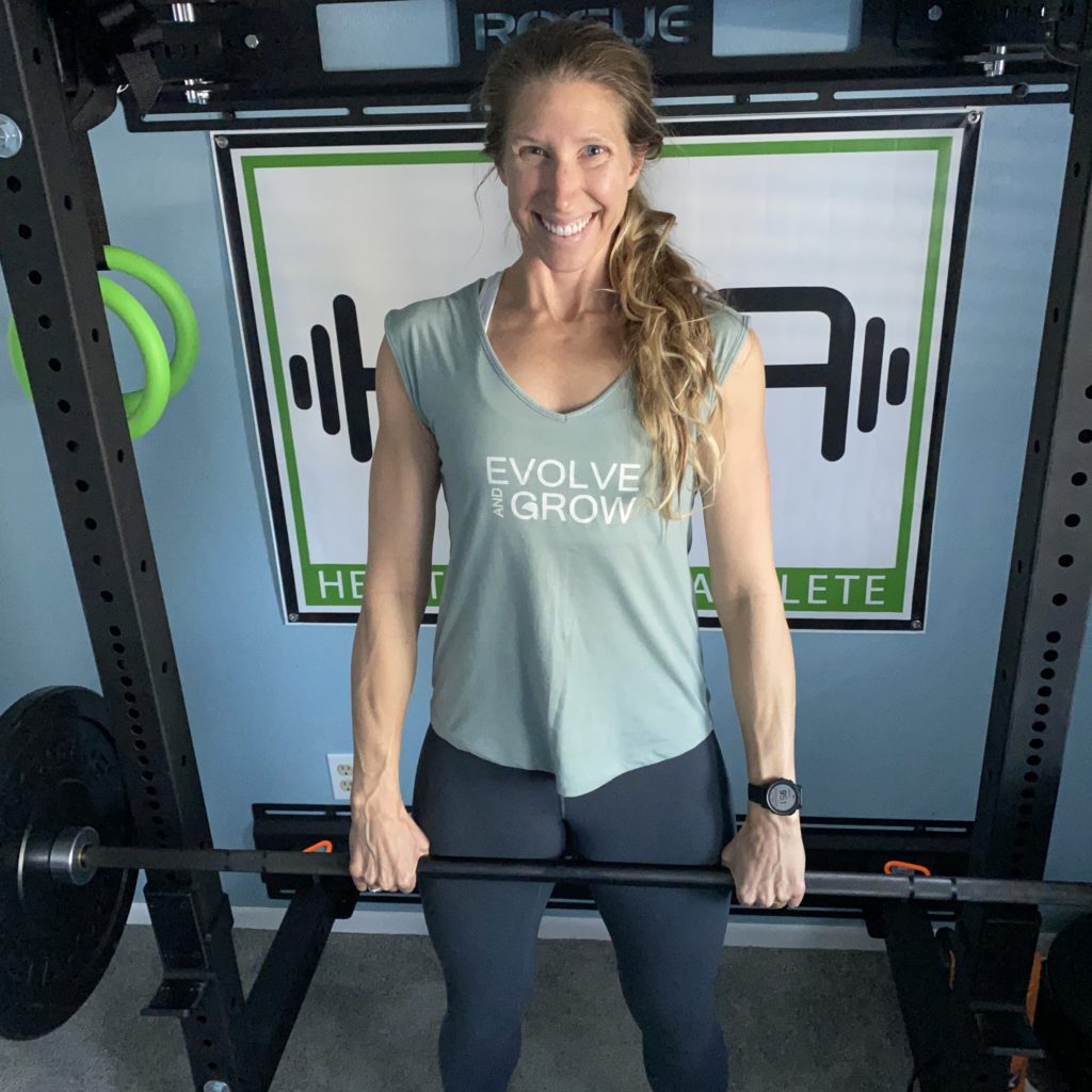 Nutrition and fitness coach, Karen Simpson working out in the gym.