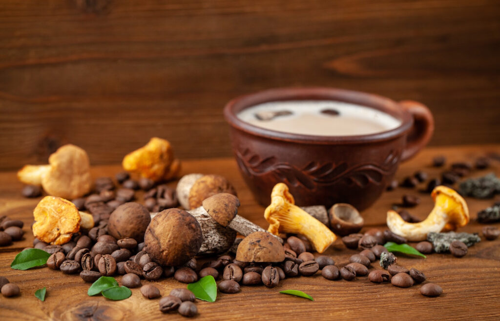 Mushroom coffee in a cup on a wooden table